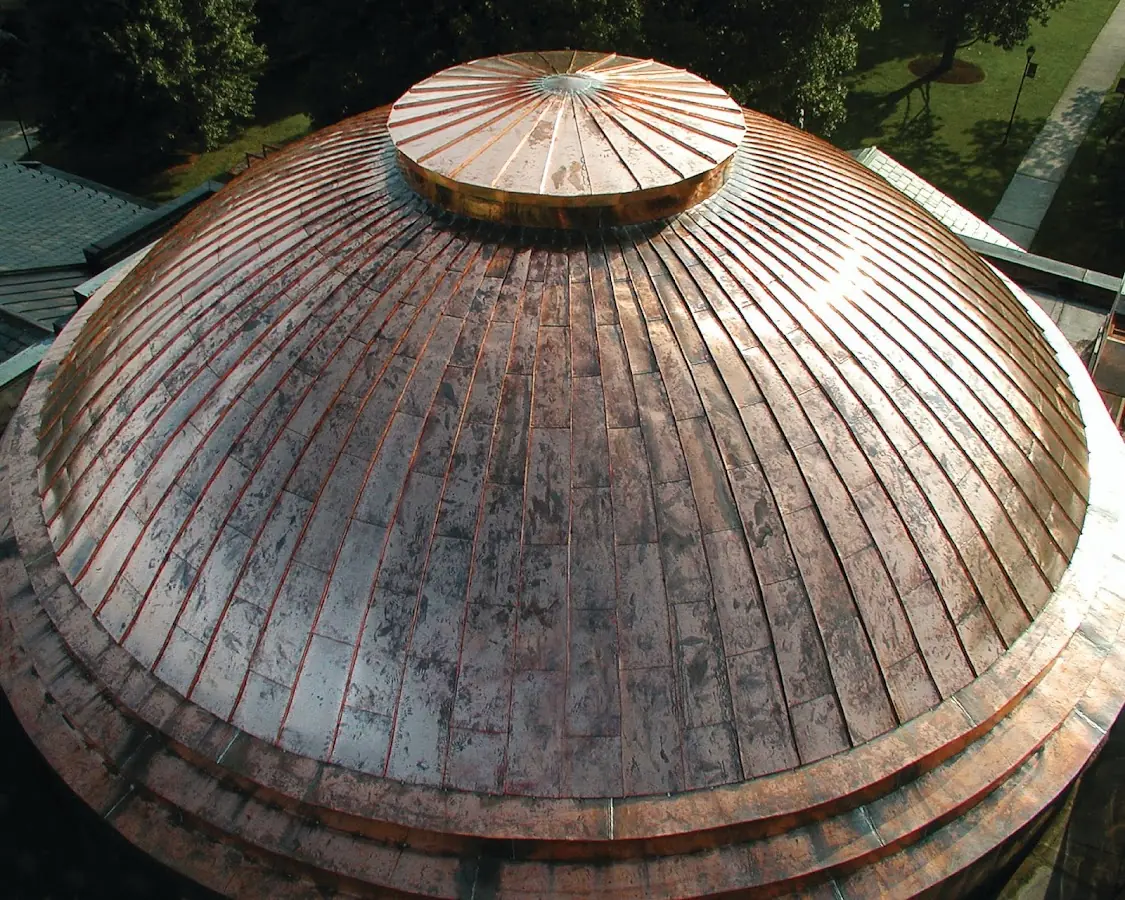 Craftsman Roofing crew installing a new roof in Le Roy